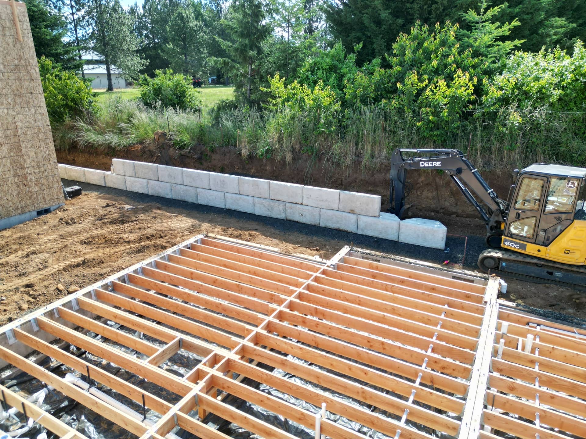 Aerial view of a PacWest commercial retaining wall and excavation site in Oregon