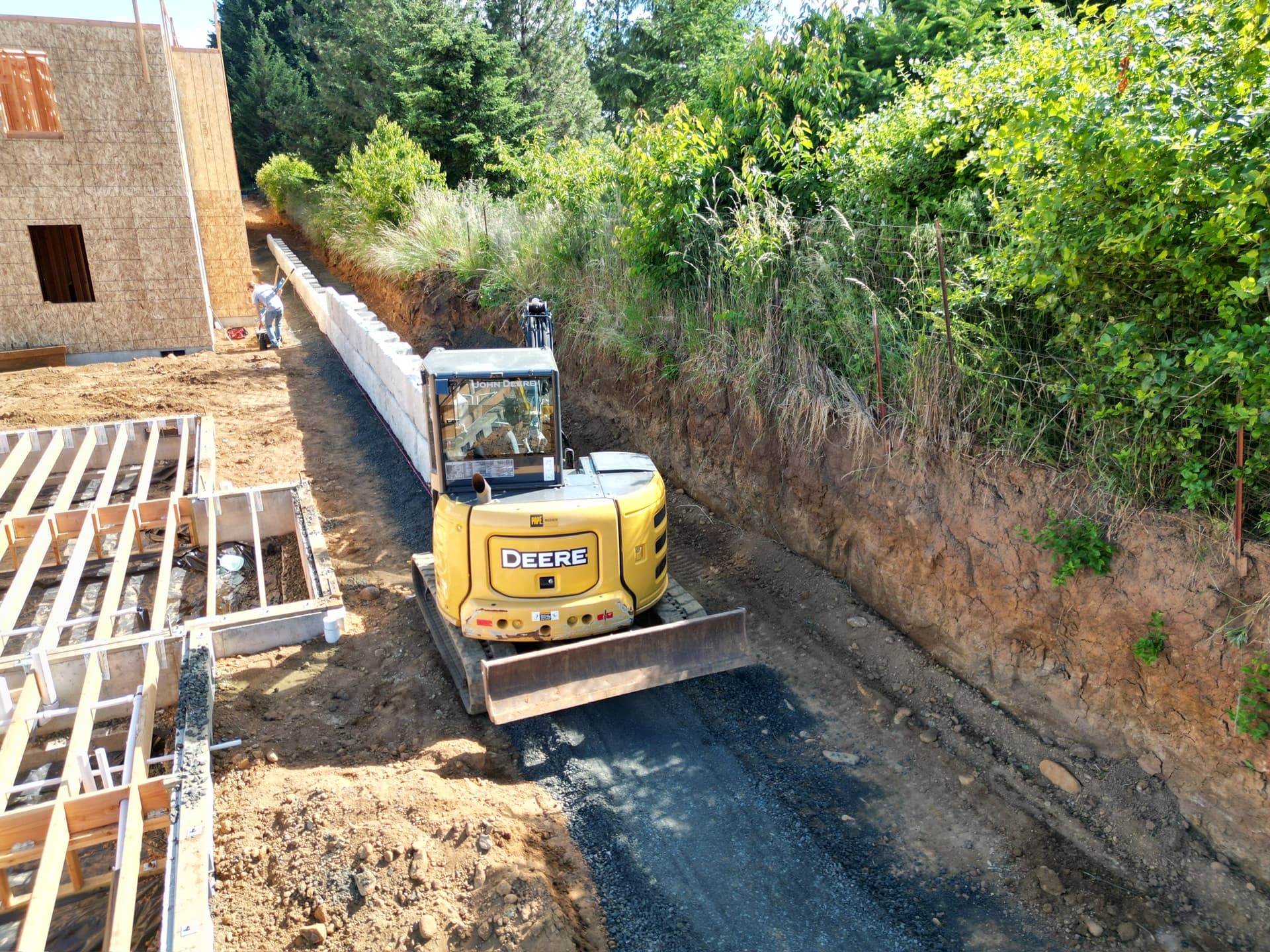 Retaining wall installation in progress