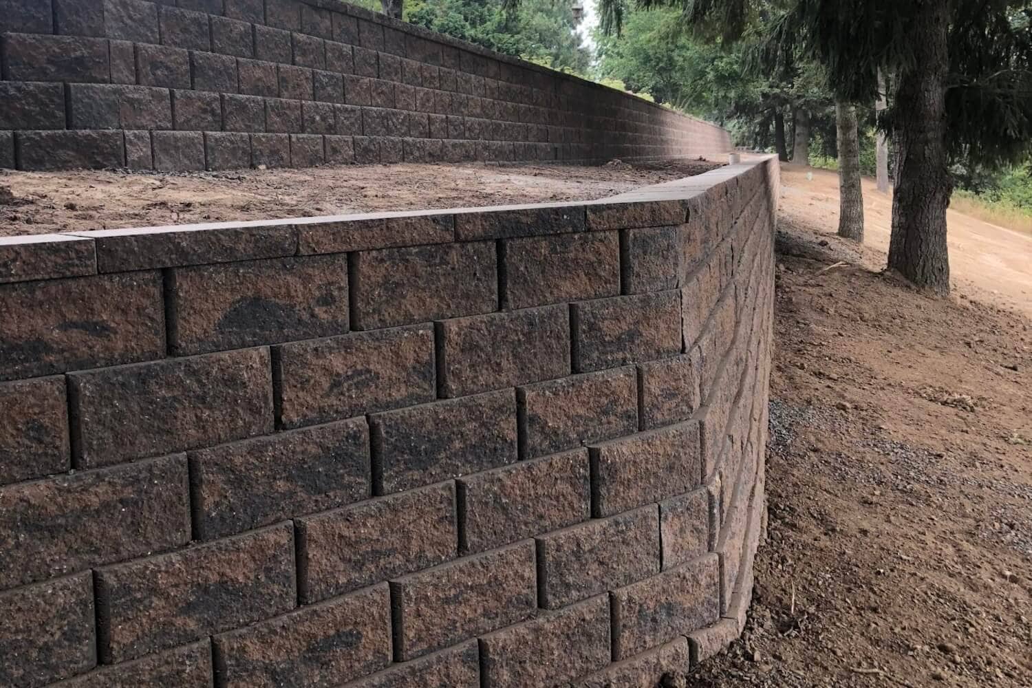 Stop Erosion Quick: How Retaining Walls Keep Commercial Yards Safe