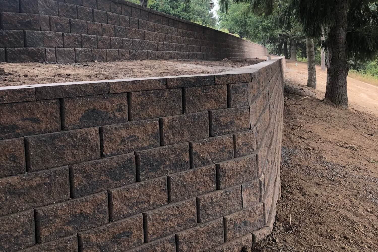 Stop Erosion Quick: How Retaining Walls Keep Commercial Yards Safe